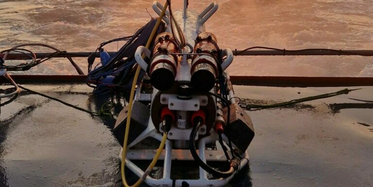 The MAPPEM3D system visible on the deck of a vessel at sunrise.